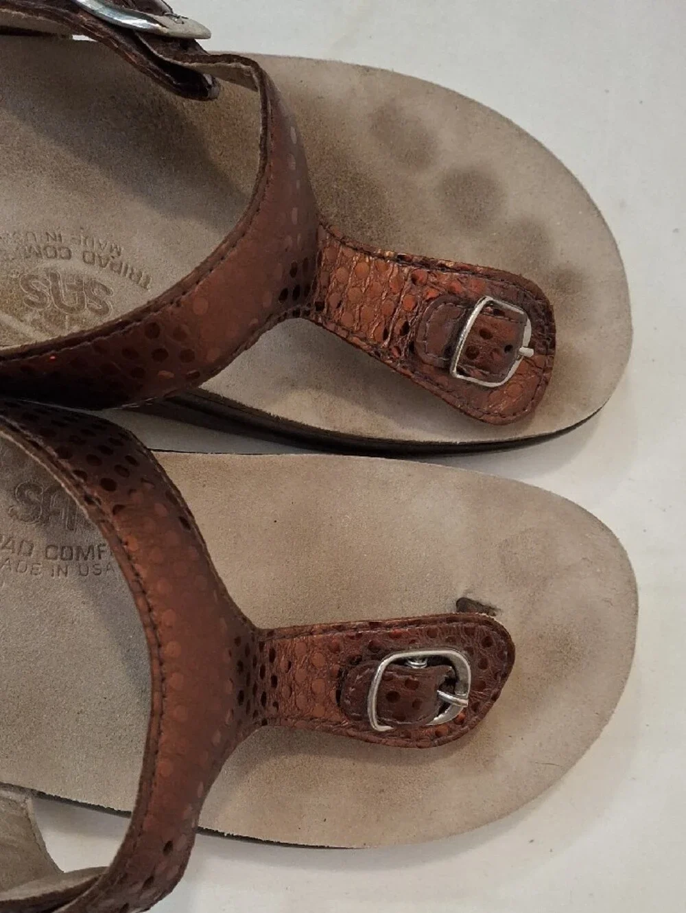 SAS Sanibel Metallic Bronze Gold Thong T Strap Sandals with Gold Buckle Detail.